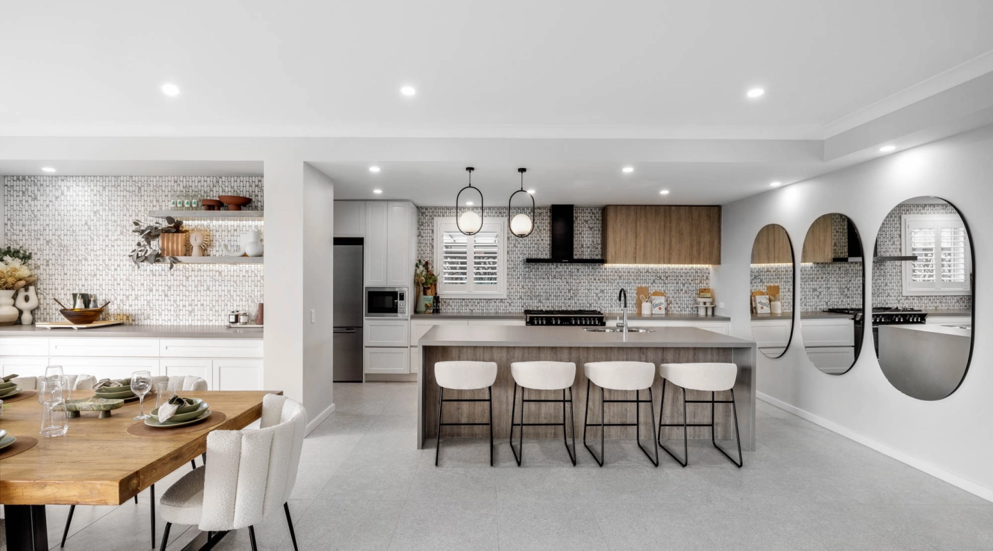 patterned splash back and crips white cabinetry with timber accents ties the space together aesthetically at tallowood 52
