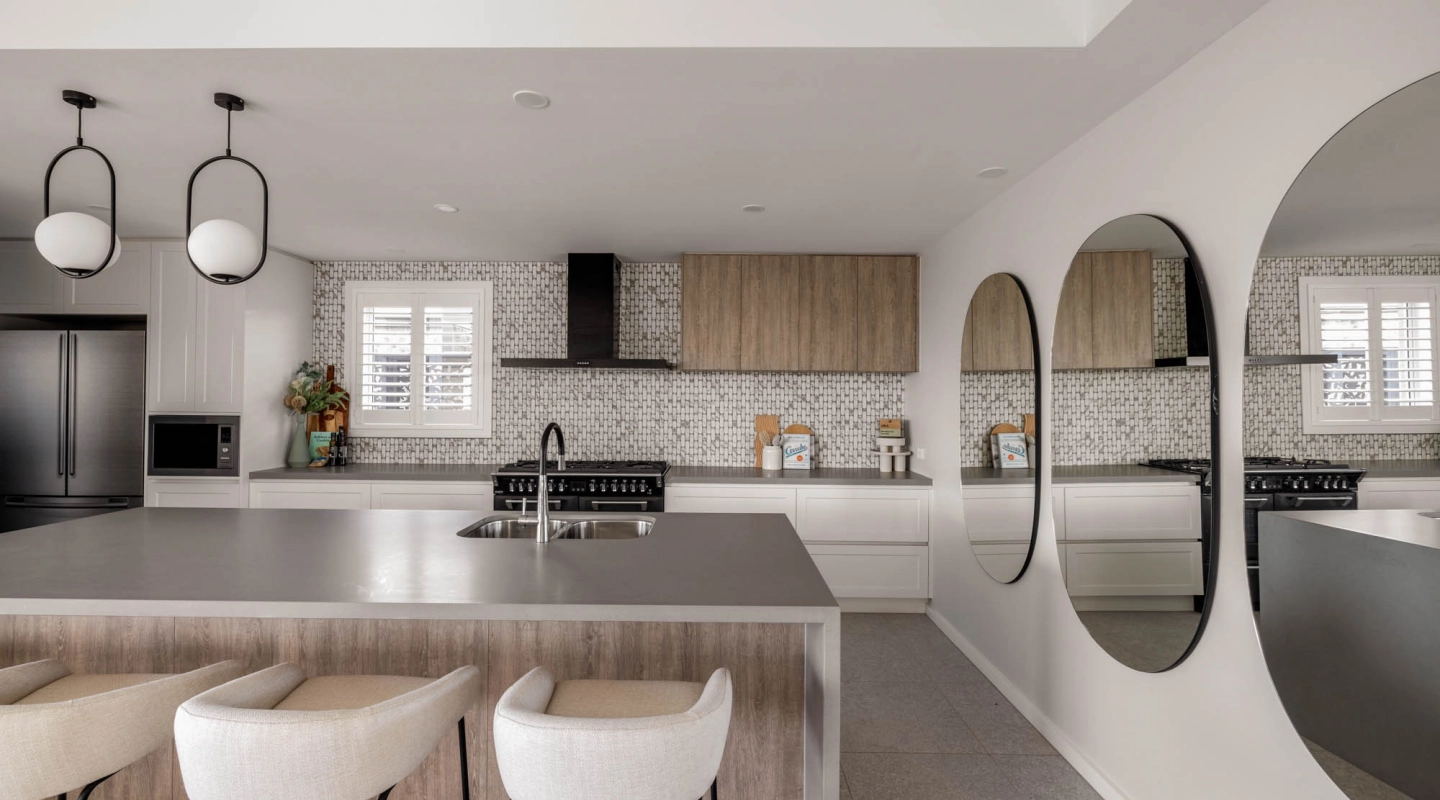 large mirrors open up the spaces and reflect a wider swath of the room